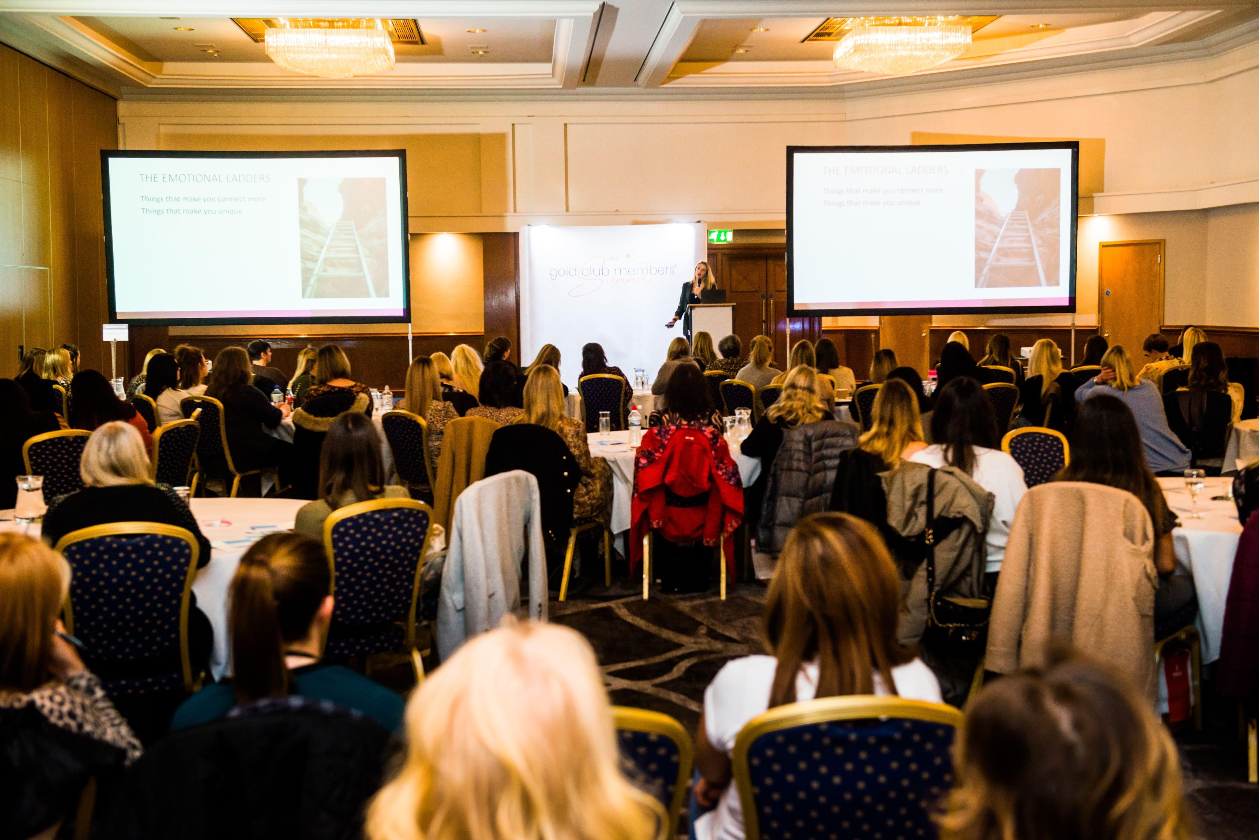 Hollie Power on stage at Gold Club Members' Summit 2021